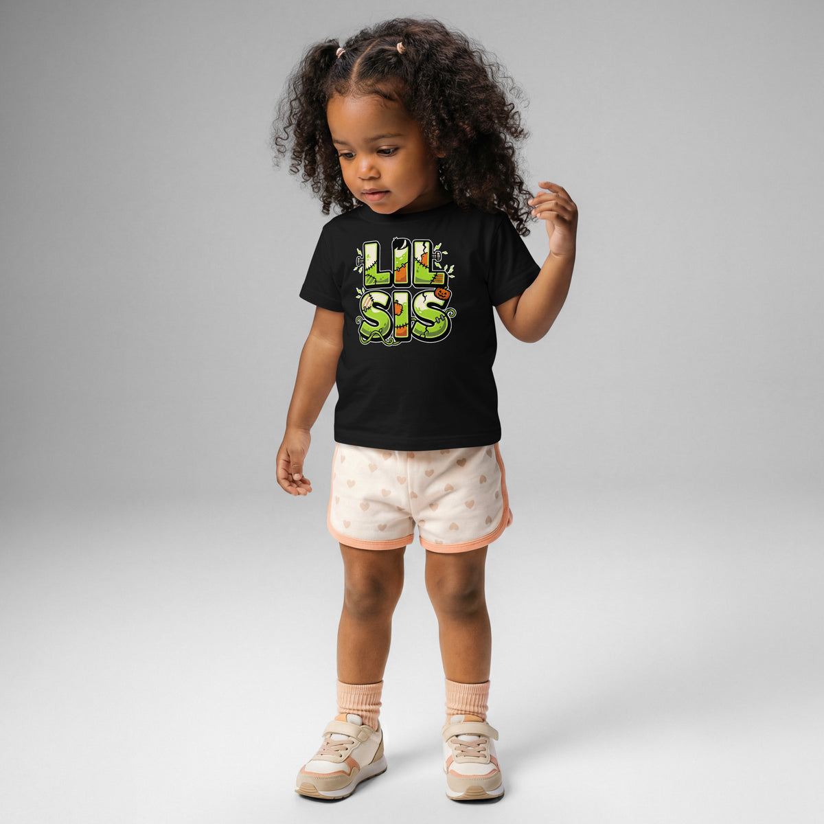 LIL SIS Halloween monster name Baby Jersey T-Shirt in Charcoal with spooky front lettering and blank back