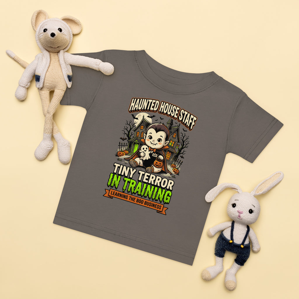 Haunted House Staff Baby “Tiny Terror in Training” Baby Jersey T-Shirt with Tiny Terror in Training front design and matching BABY back graphic for Halloween family outfits