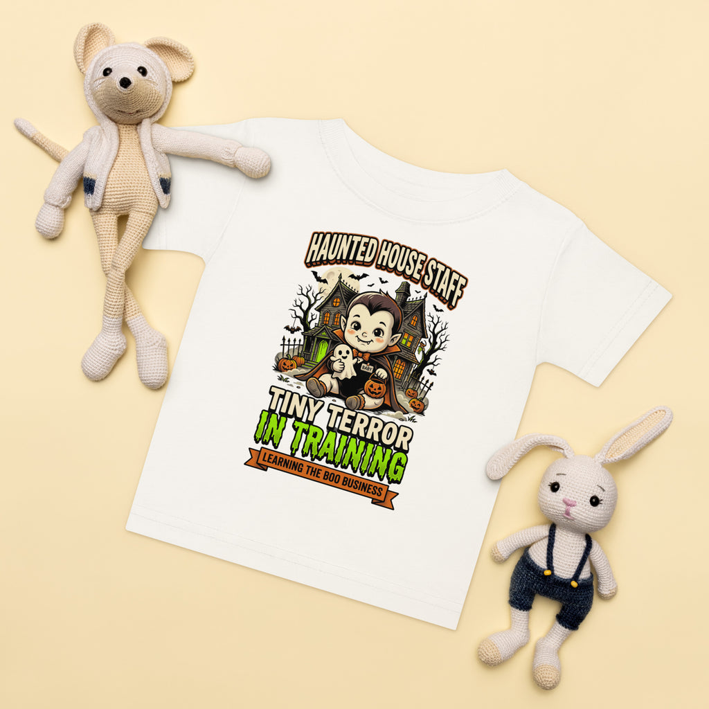 Haunted House Staff Baby “Tiny Terror in Training” Baby Jersey T-Shirt with Tiny Terror in Training front design and matching BABY back graphic for Halloween family outfits