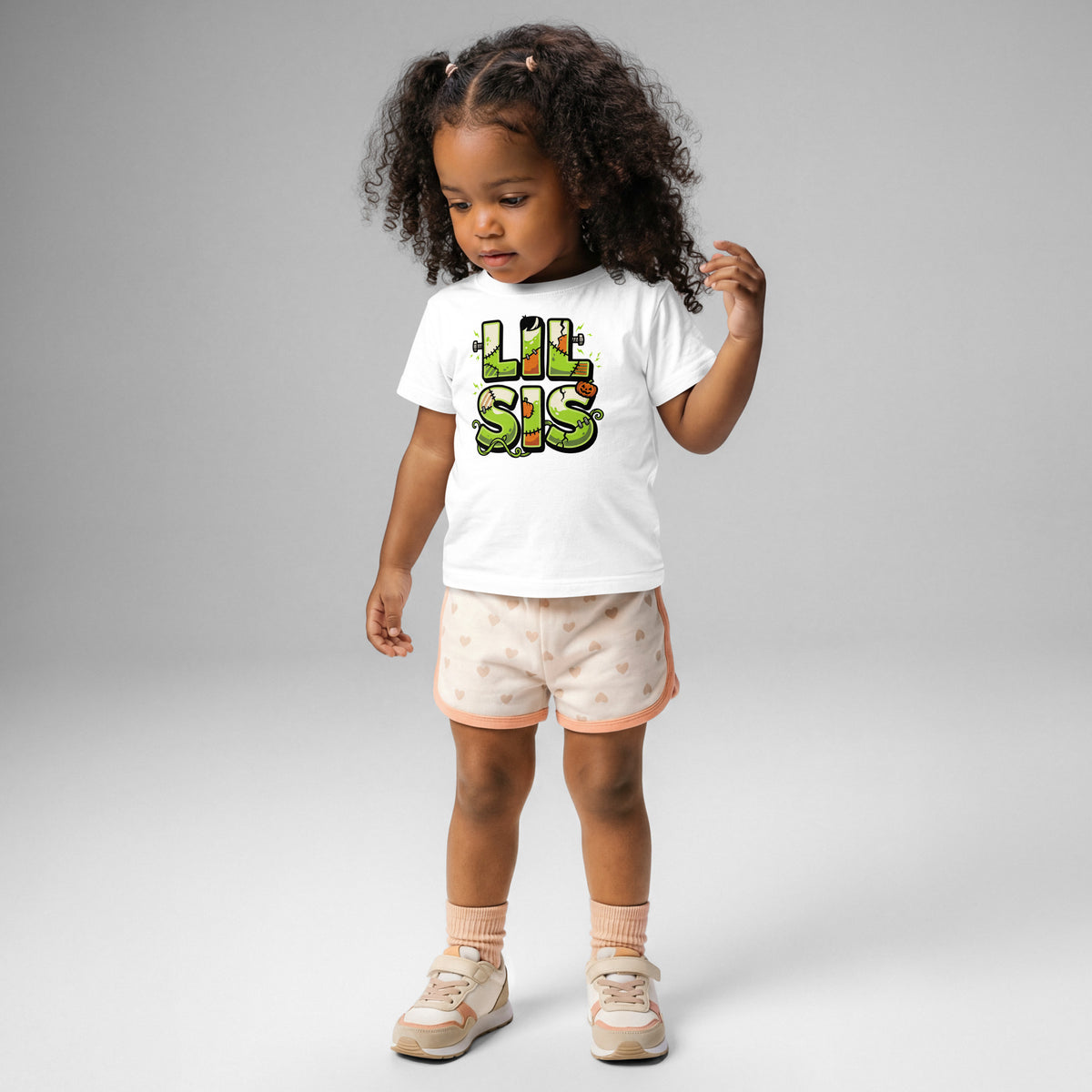 LIL SIS Halloween monster name Baby Jersey T-Shirt in Charcoal with spooky front lettering and blank back