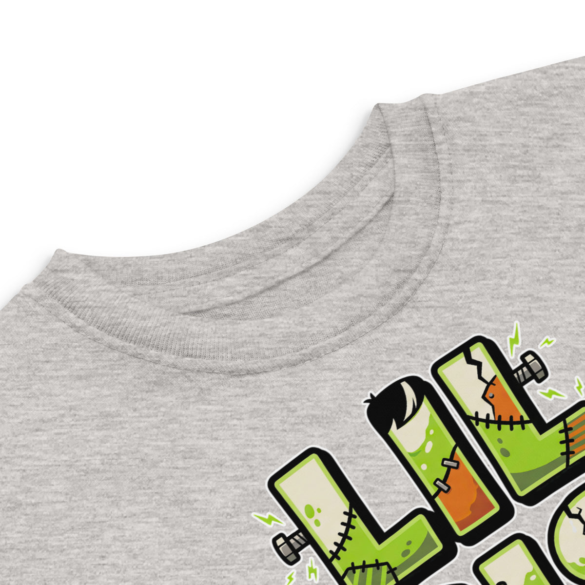 LIL SIS Halloween monster name Toddler Jersey T-Shirt in White with spooky front lettering and blank back