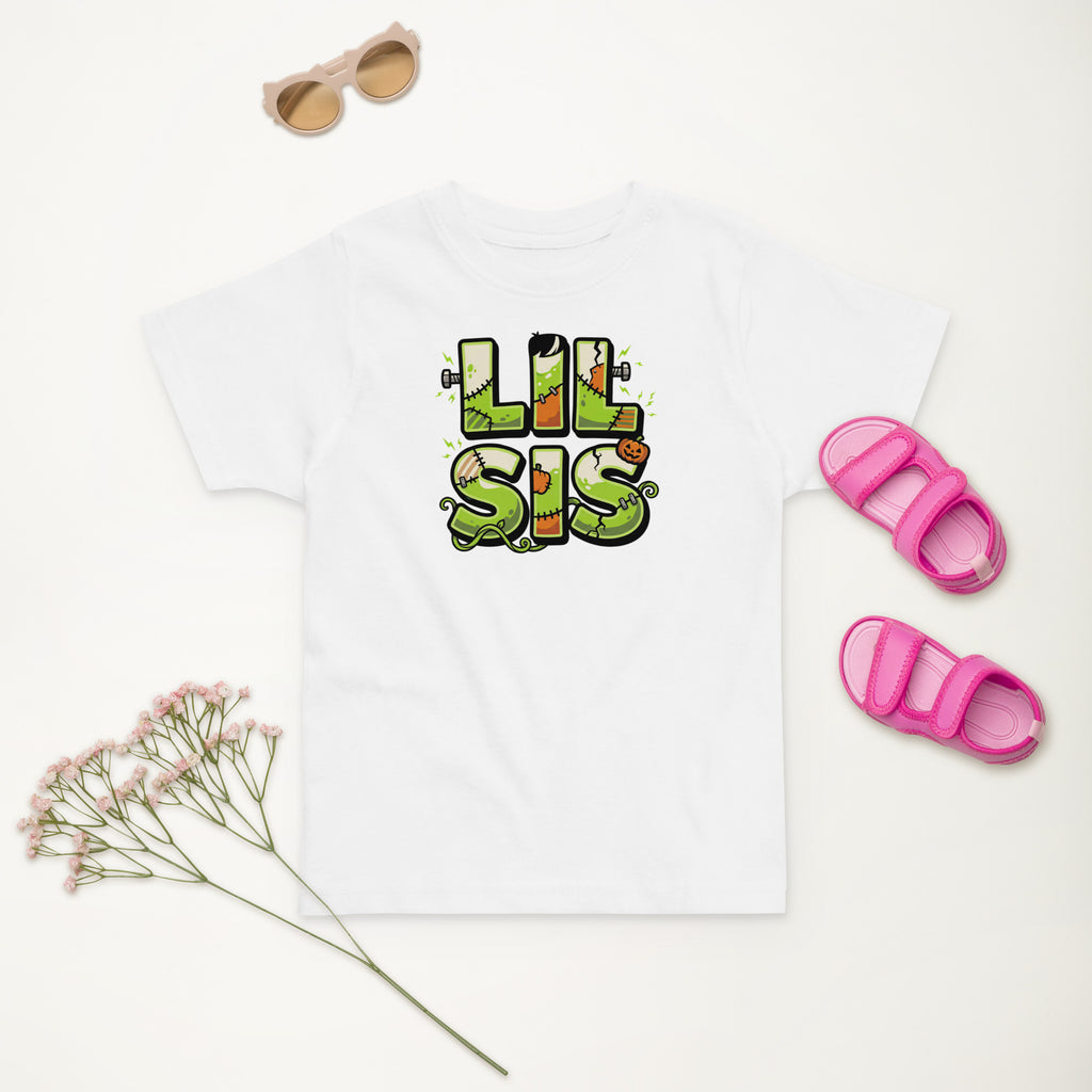 LIL SIS Halloween monster name Toddler Jersey T-Shirt in Heather with spooky front lettering and blank back