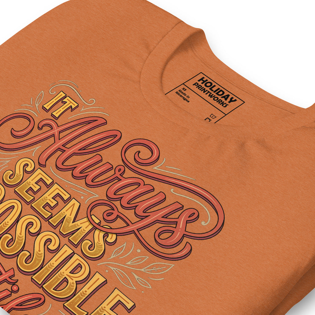 Back/detail view of It Always Seems Impossible Until It’s Done graphic T-shirt