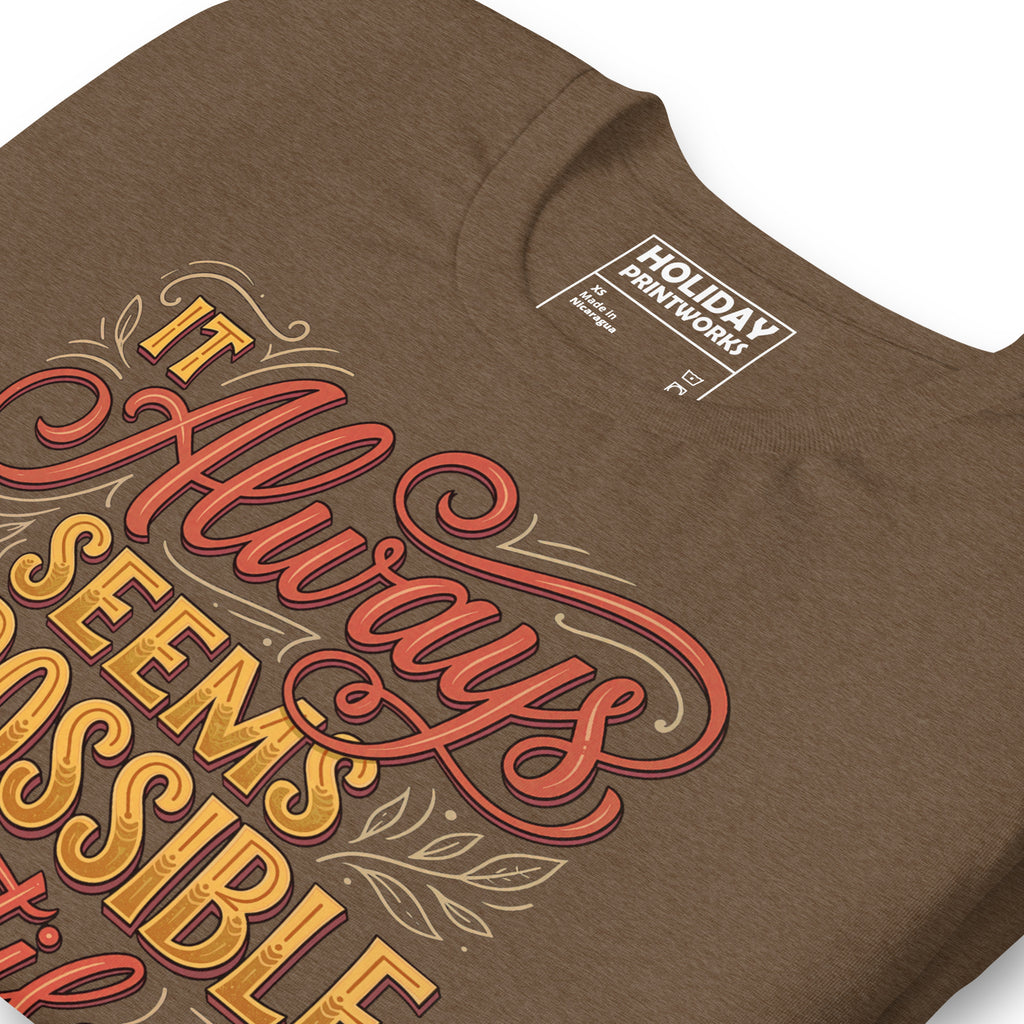 Back/detail view of It Always Seems Impossible Until It’s Done graphic T-shirt