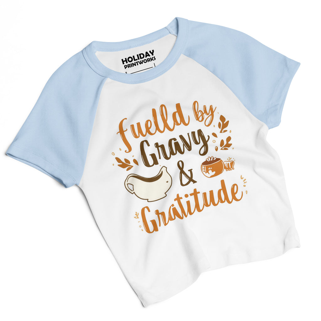 Back/detail view of Fueled by Gravy & Gratitude – Women’s Micro Rib Raglan Baby Tee graphic T-shirt