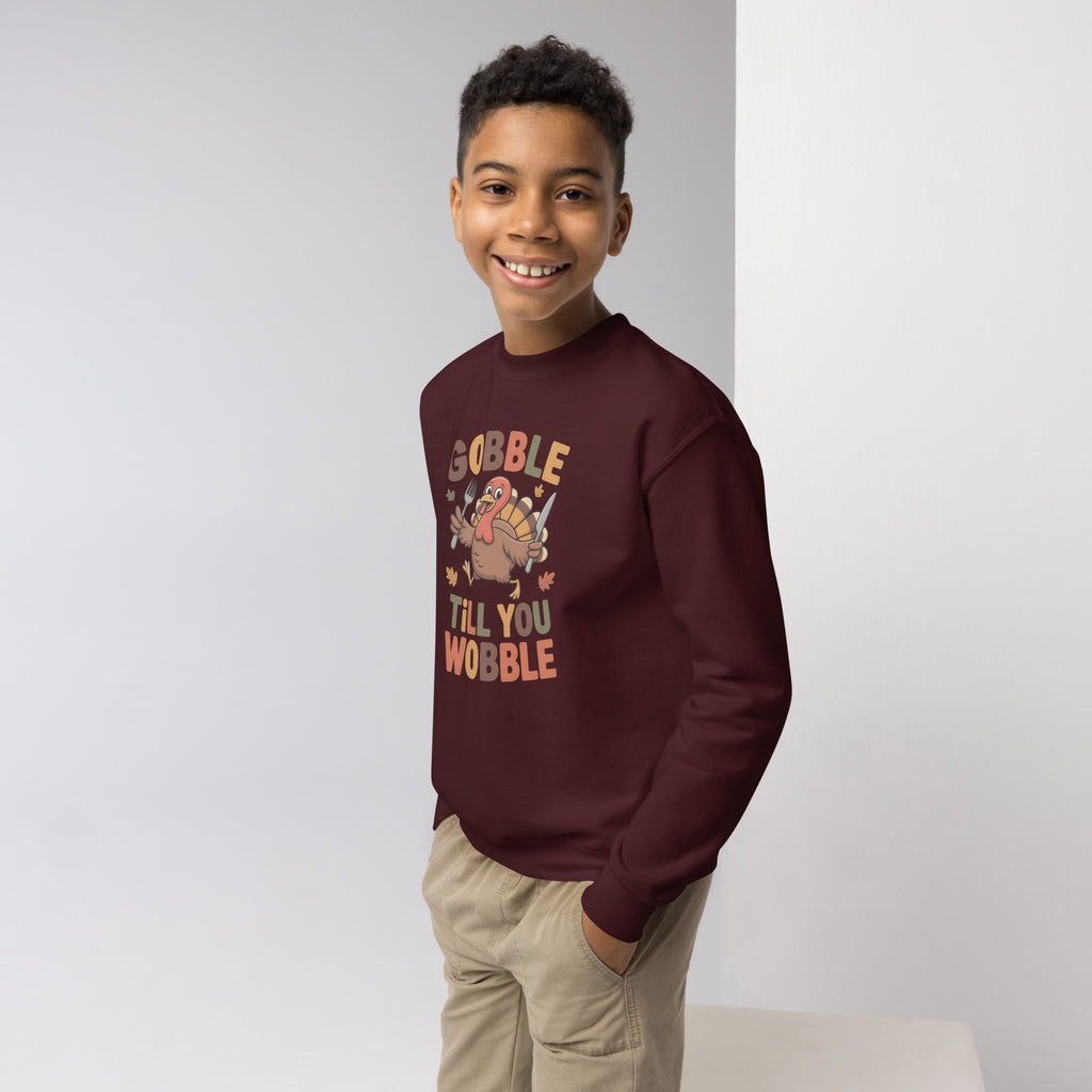 Back/detail view of Gobble Till You Wobble – Youth Crewneck Sweatshirt graphic sweatshirt